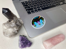 Load image into Gallery viewer, Gemini twins vinyl die cut sticker in use on laptop surrounded by crystals
