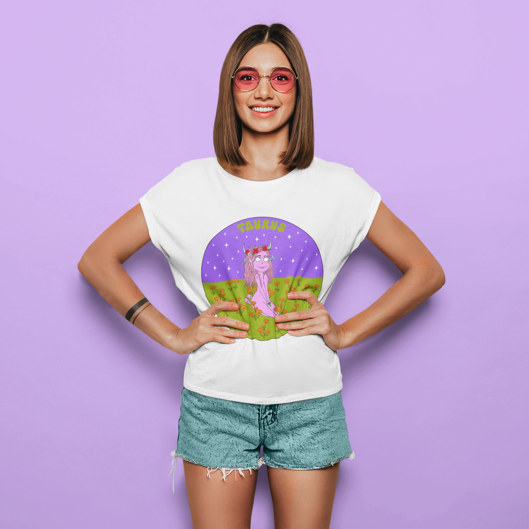 Cute girl with her hands on her hips wearing a Taurus Cosmic Apparel T-Shirt